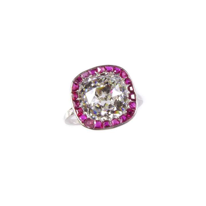 Cushion cut diamond and ruby cluster ring, set with a 4.83ct cushion